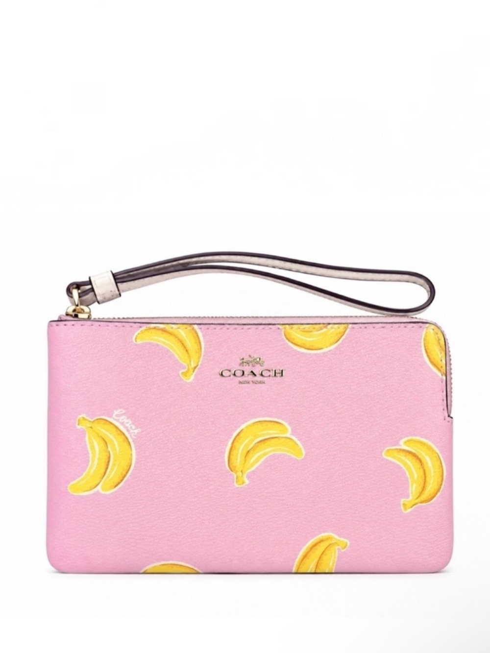 COMING SOON
Coach Corner Zip Pink Banana Print Wristlet